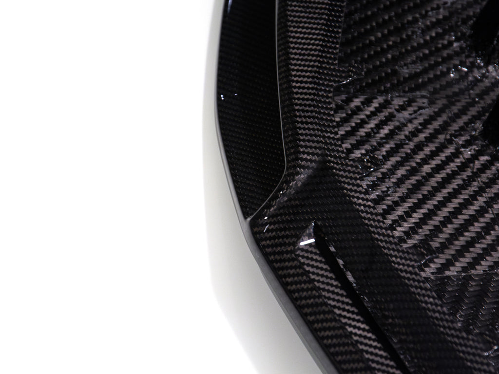 Close-up corner detail of Audi R8 carbon fiber front lip splitter for 2016 2017 2018 Gen 2