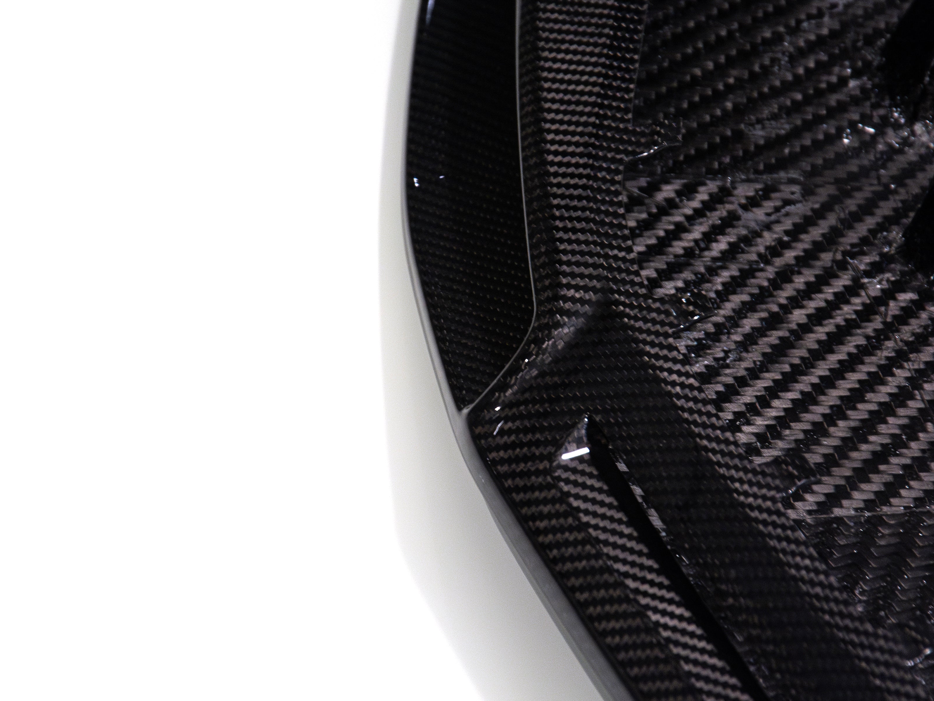 Close-up corner detail of Audi R8 carbon fiber front lip splitter for 2016 2017 2018 Gen 2