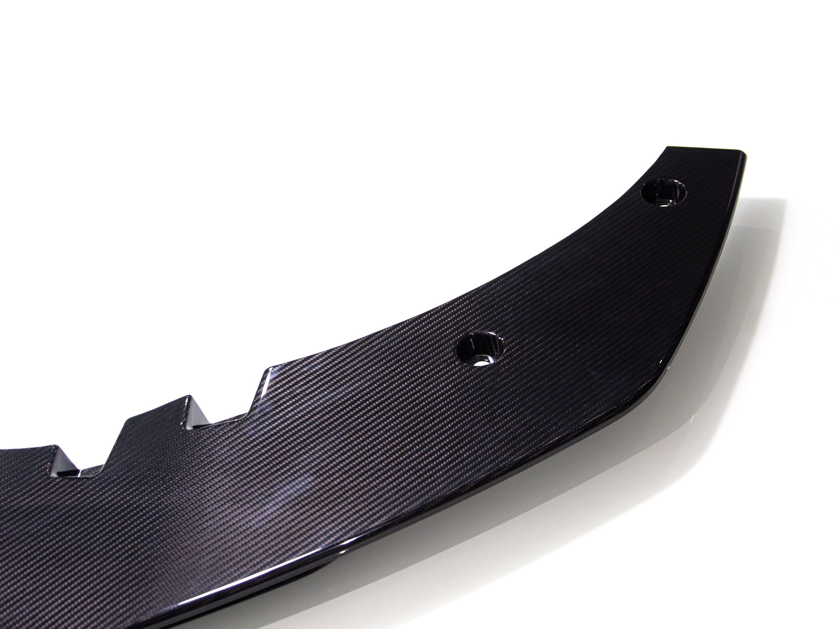 Close-up mounting detail of Audi R8 carbon fiber front lip splitter for 2016 2017 2018 Gen 2
