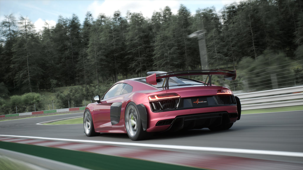 Avalanche Design Audi R8 Gen 2 rear track view with carbon fiber roof scoop and dual element rear wing