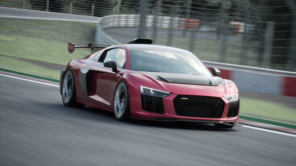 Avalanche Design Audi R8 Gen 2 on track with carbon fiber aero, roof scoop, vented hood and dual element rear wing